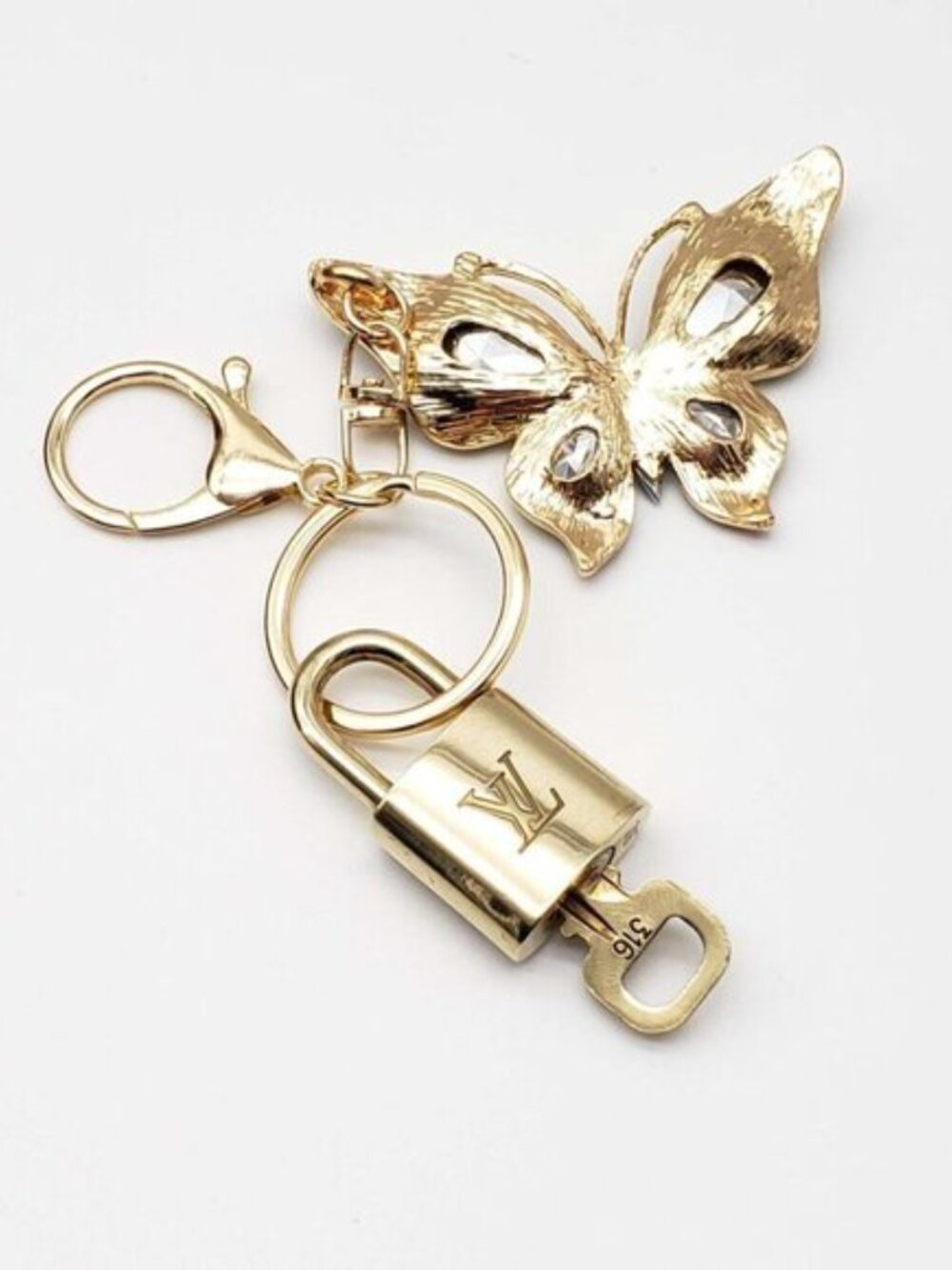 LV Authentic Gold Padlock 🔒 Key Set w/ Unbranded Butterfly Keychain Charm - Picture 7 of 8